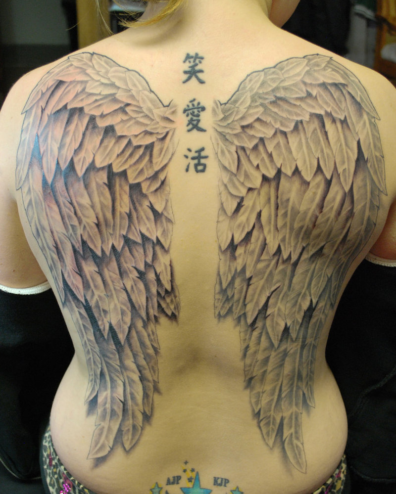 Wing tattoos on back for guys