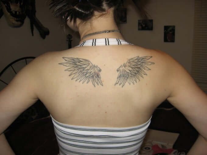angel wings tattoo design on back shoulder blade for females