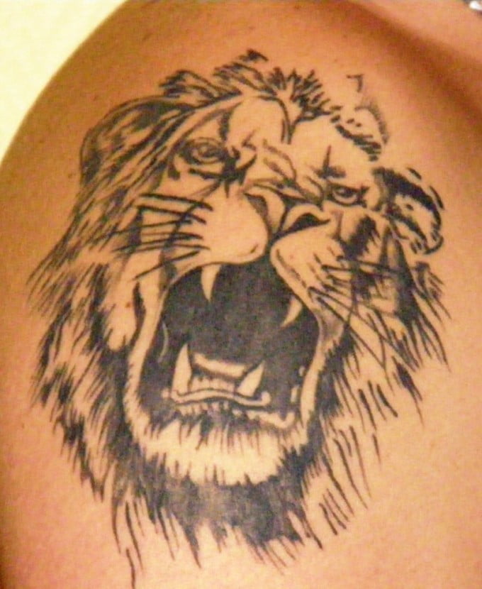 33 lion tattoo