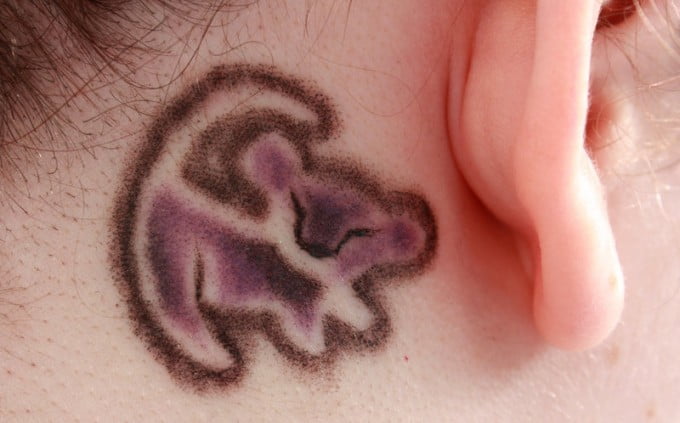 9 lion tattoo