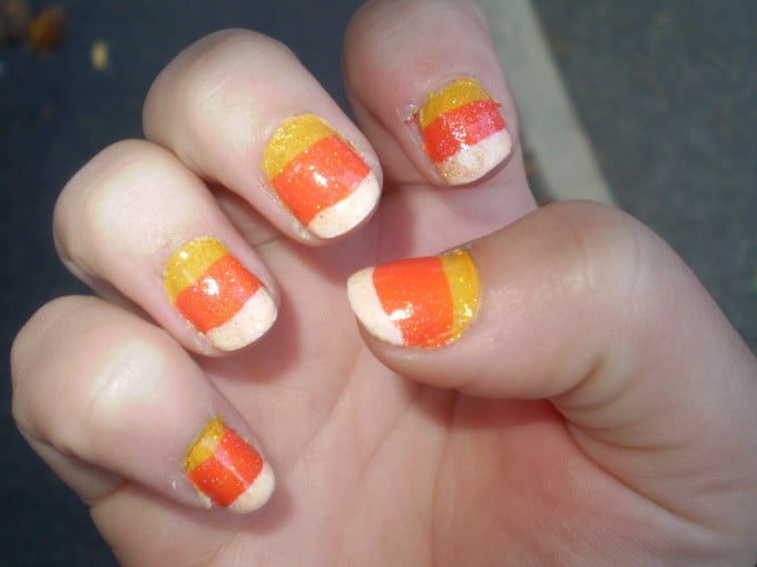 candy corn painted nail art design idea for happy halloween