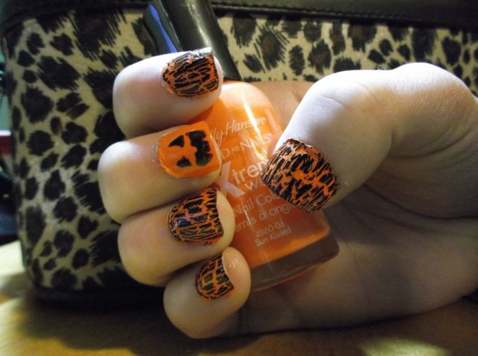 orange pumpkin spooky nail art design idea for halloween