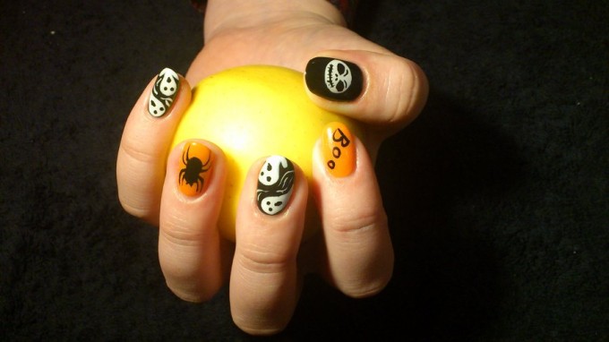 spooky stickers black and orange nail art design idea for halloween