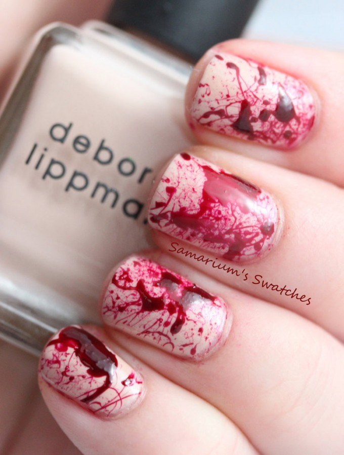 blood splatter spooky nail art design idea for halloween
