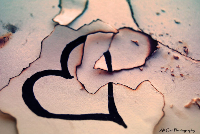 broken heart burned like paper with fire