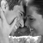 happy couples black and white picture in rain