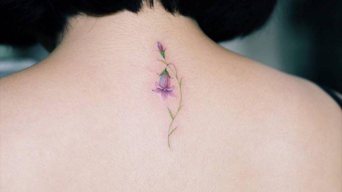 small Watercolor campanula punctata flower tattoo on neck back
