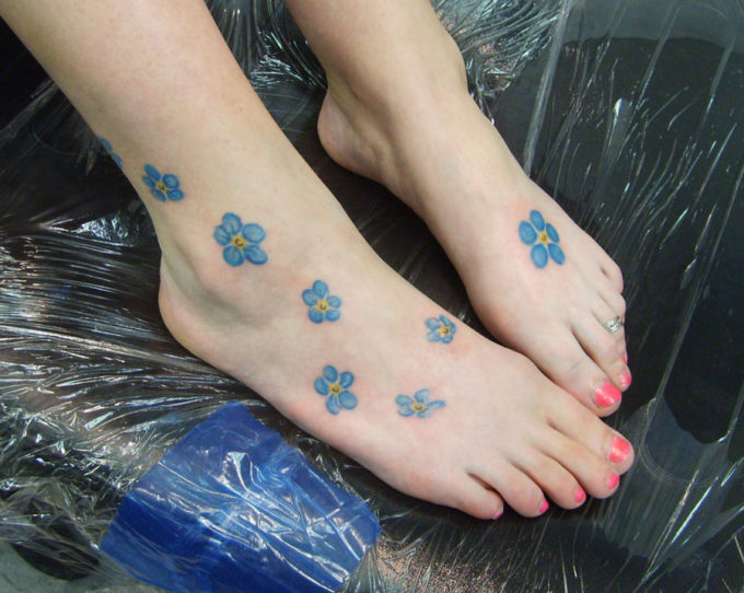 Blowing cute forget me not flower pattern tattoo