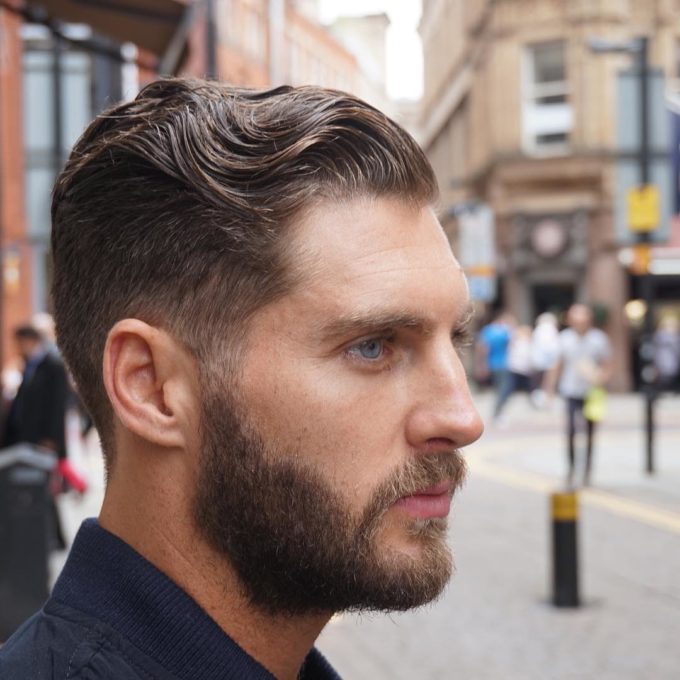 wavy slicked back mens hairstyle