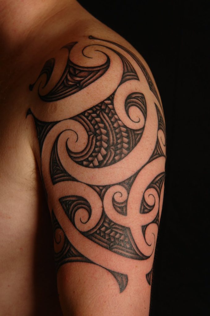 Half Sleeve Maori culture Koru tattoo