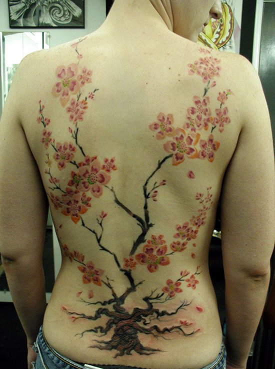 Flowers and Tree of life tattoos