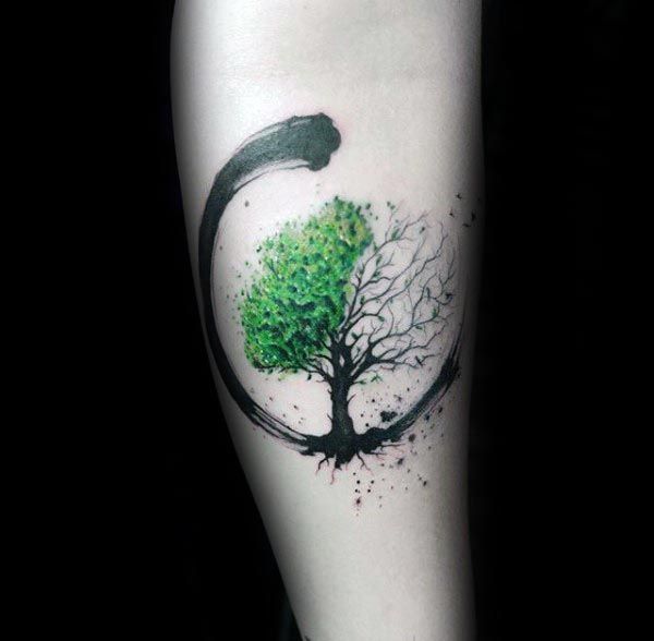 Half green and Half dry tree of life tattoo
