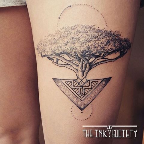 Mayan tree of life tattoo on thigh