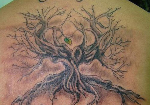 Single leaf tree of life tattoo