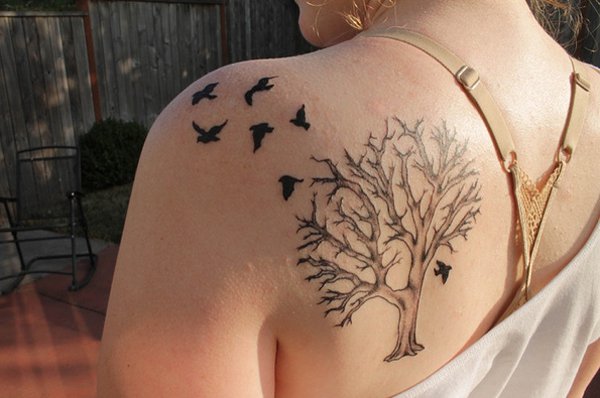Tree of life tattoo design with birds on back