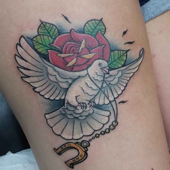 dove and rose with magnet tattoo