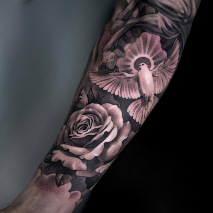 dove rose and horse tattoo portrait on arm