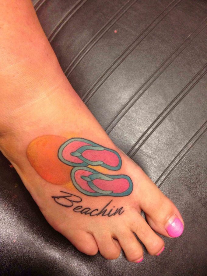 flip flop sunset beachin tattoo on feet