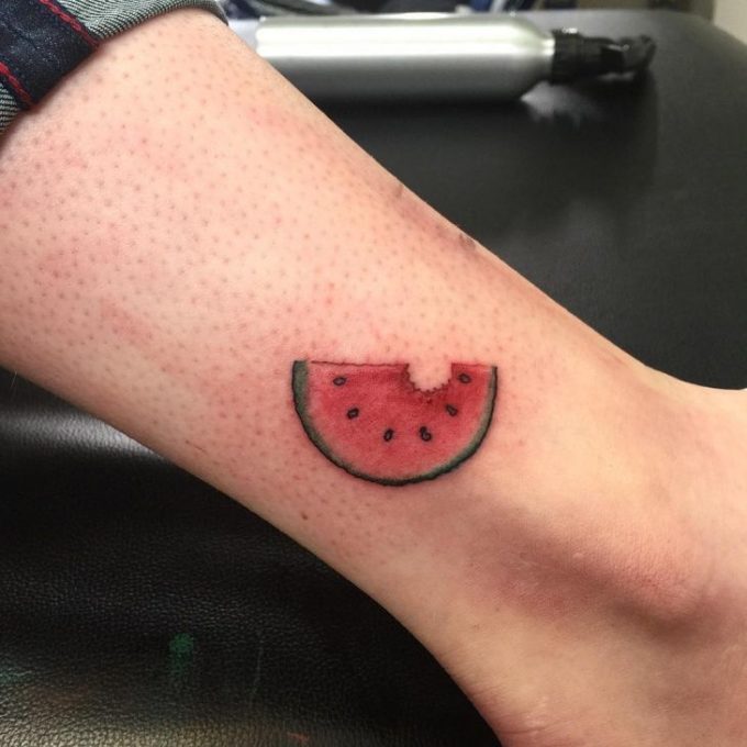 water melon tattoo on side ankle