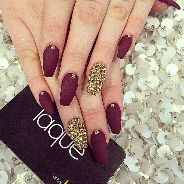 burgundy nails with golden pearls