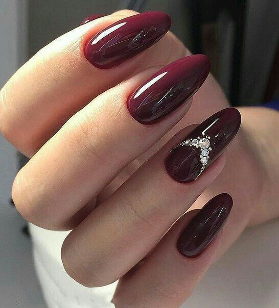 burgundy nails with pearls on single finger