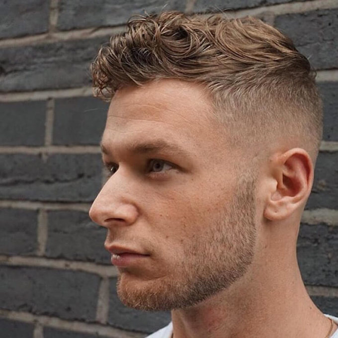 high fade short wavy haircut for men