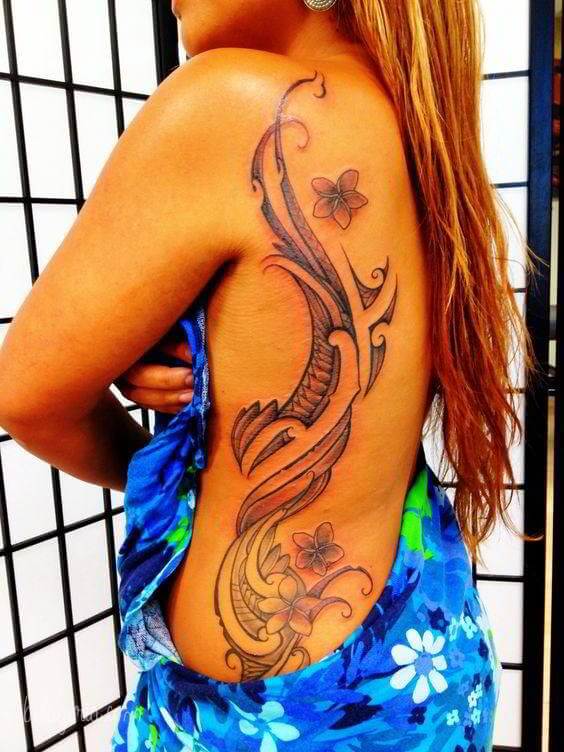 tribal plumeria flower tattoo design on ribs for women