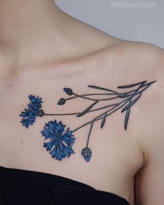 conflower tattoo design on collarbone