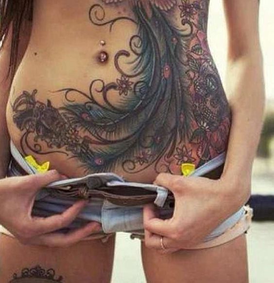 tattoos over stretch marks
