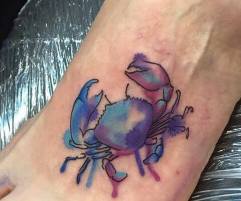 waterink crab tattoo design on foot