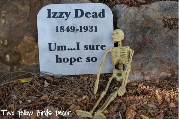 funny cemetery headstone decorations with skeleton for halloween