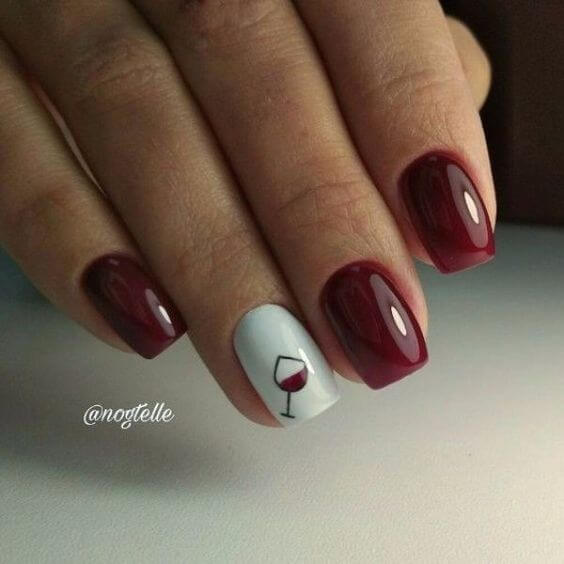shiny gel nails with wine glass