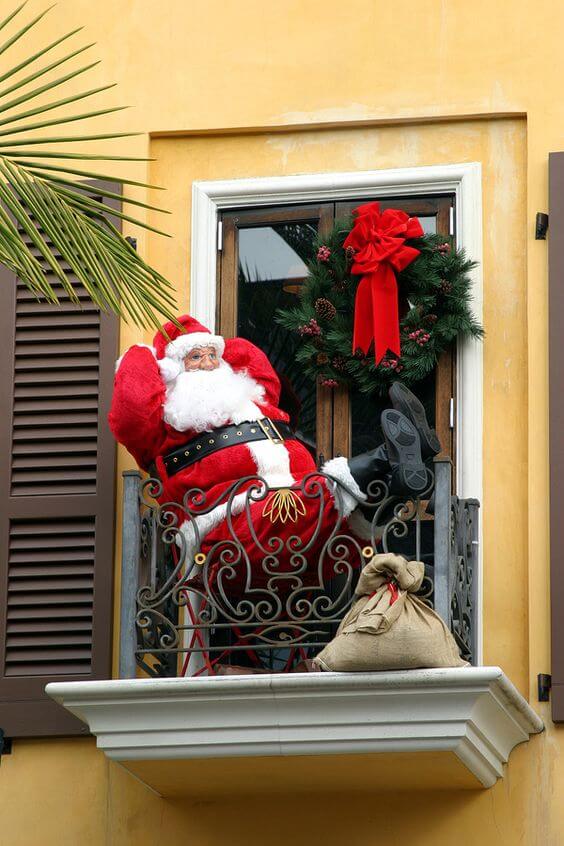apartment balcony christmas decor with santa claus