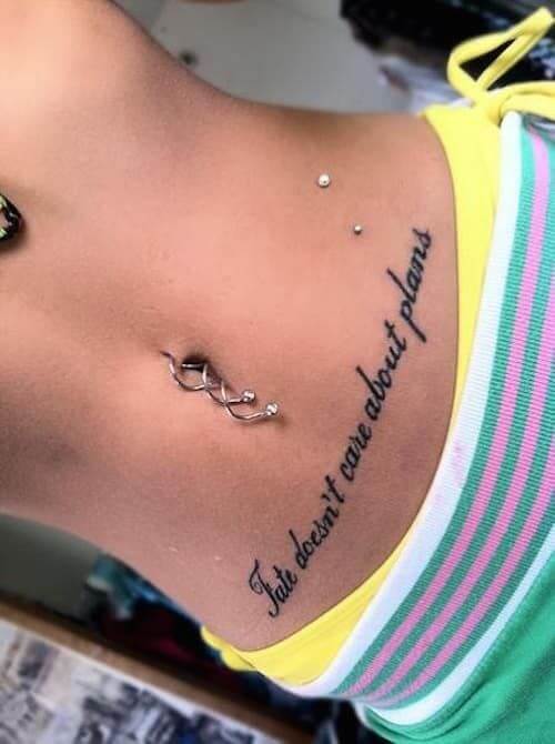 bellow belly button quote tattoo for girls