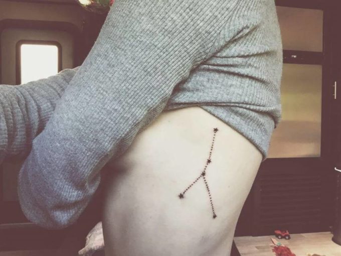 constellation cancer zodiac sign tattoo on side stomach for women