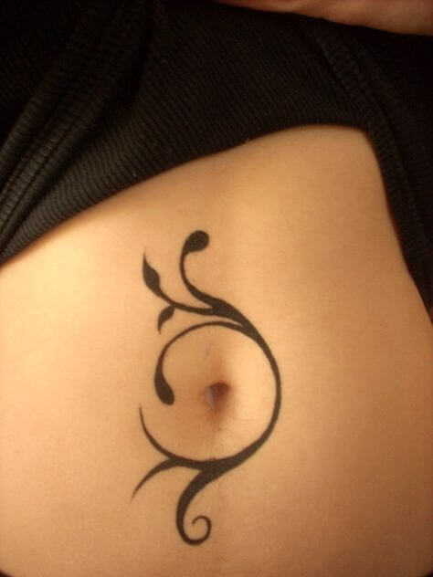 floral tattoo around the belly button for females