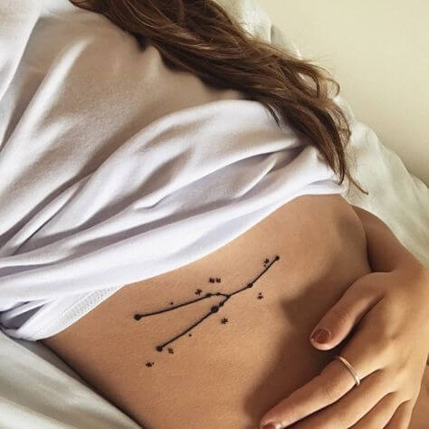 taurus star sign tattoo on stomach for girls