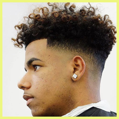 mid bald fade curly haircut