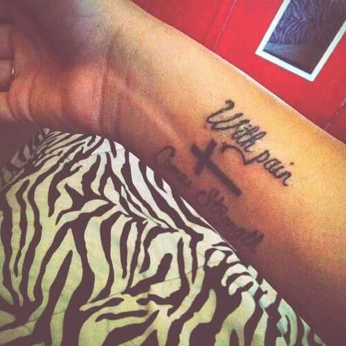 cross and with pain comes strength tattoo on wrist