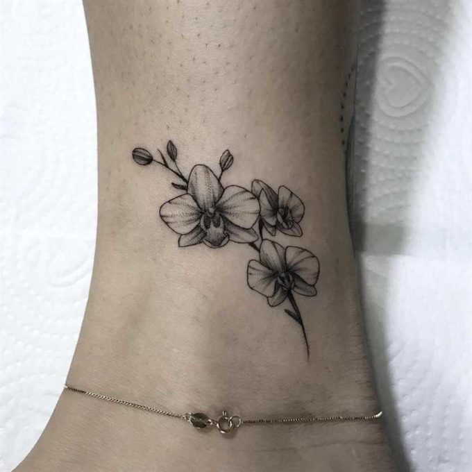 cute outlined orchid flower tattoo design on ankle