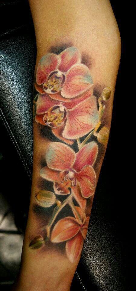 orchid flower tattoo design on forearm