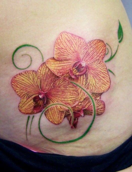 orchid flower tattoo design on side stomach