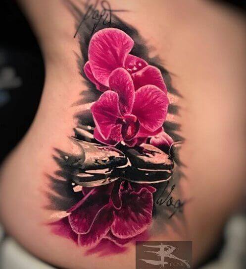 outstanding artistic orchid flower tattoo design