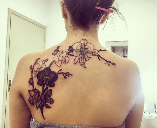 tribal orchid flower tattoo pattern design on back