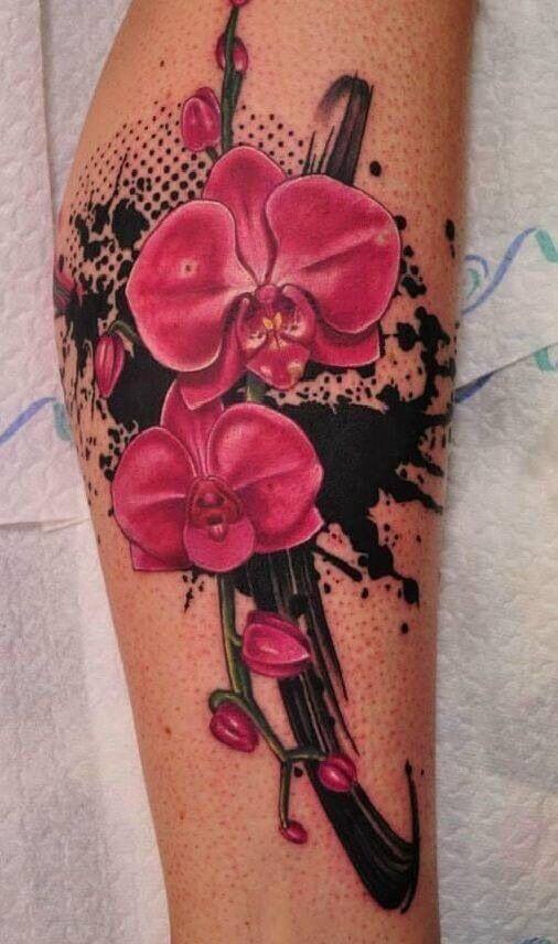 watercolor orchid flower tattoo design on leg
