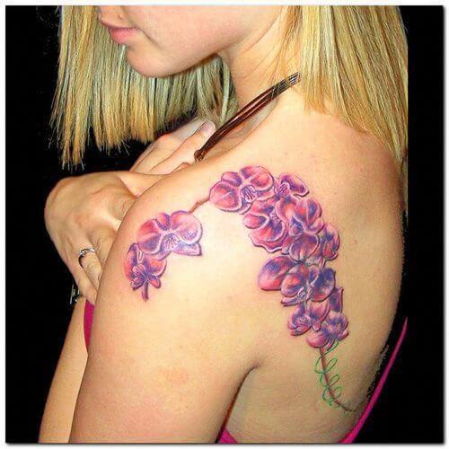 purple jasmine flowers tattoo design on shoulder blade