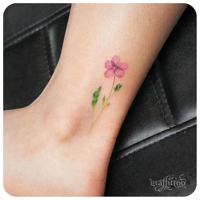 subtile jasmine flower tattoo design on ankle