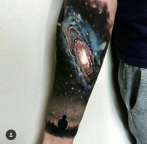 astronomy space tattoo design on forearm