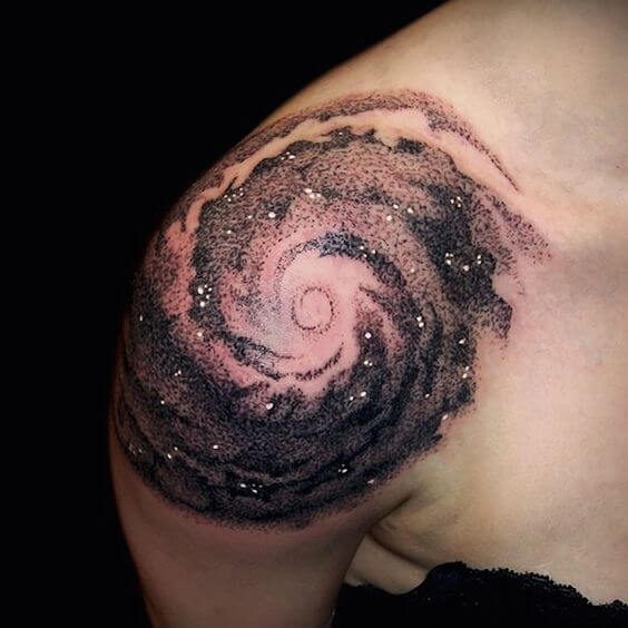 dotwork galaxy tattoo design idea on shoulder for men
