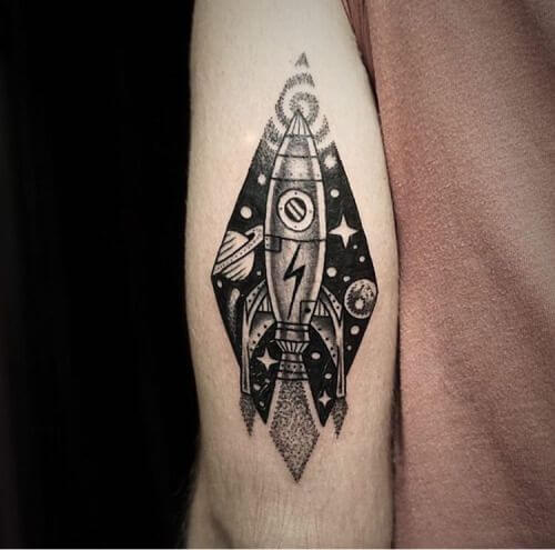 dotwork rocket tattoo design in space